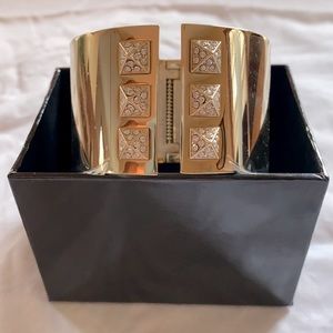 Victoria’s Secret gold and rhinestone bangle